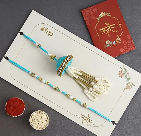 Tranquil Teal Jhumar Bhaiya-Bhabhi Pearl Rakhi Set With Almonds